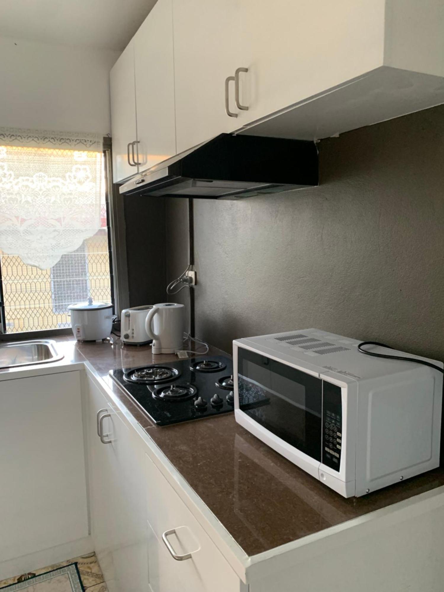 Happy Staycation Apartment
